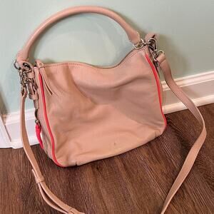 Tan Kate Spade Crossbody bag purse with funky orange stripe and accent zipper